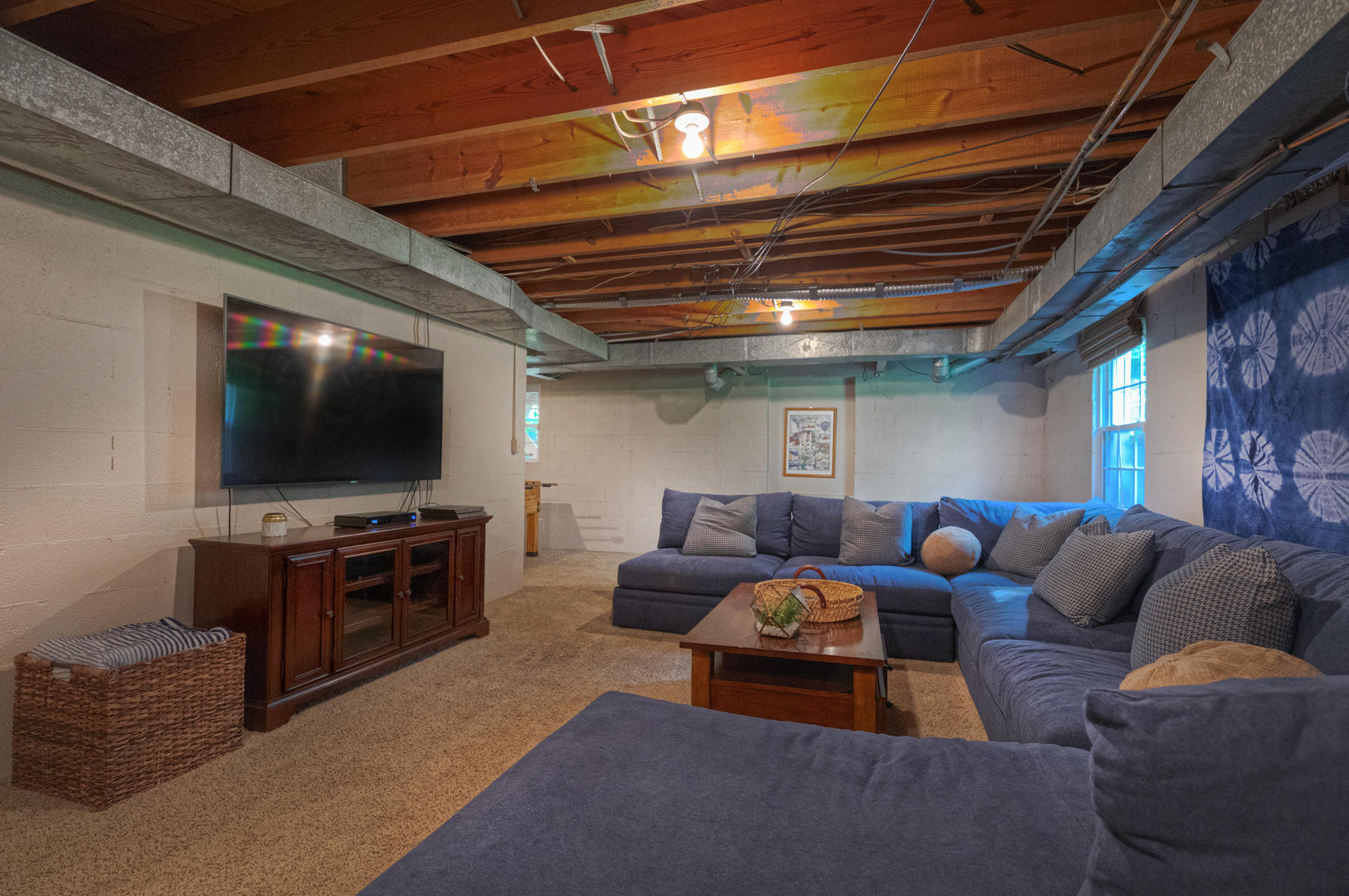 201 Parkcrest Road Southwest Roanoke, VA 24014 - Photo 26 of 39 a living room with furniture and a flat screen tv
