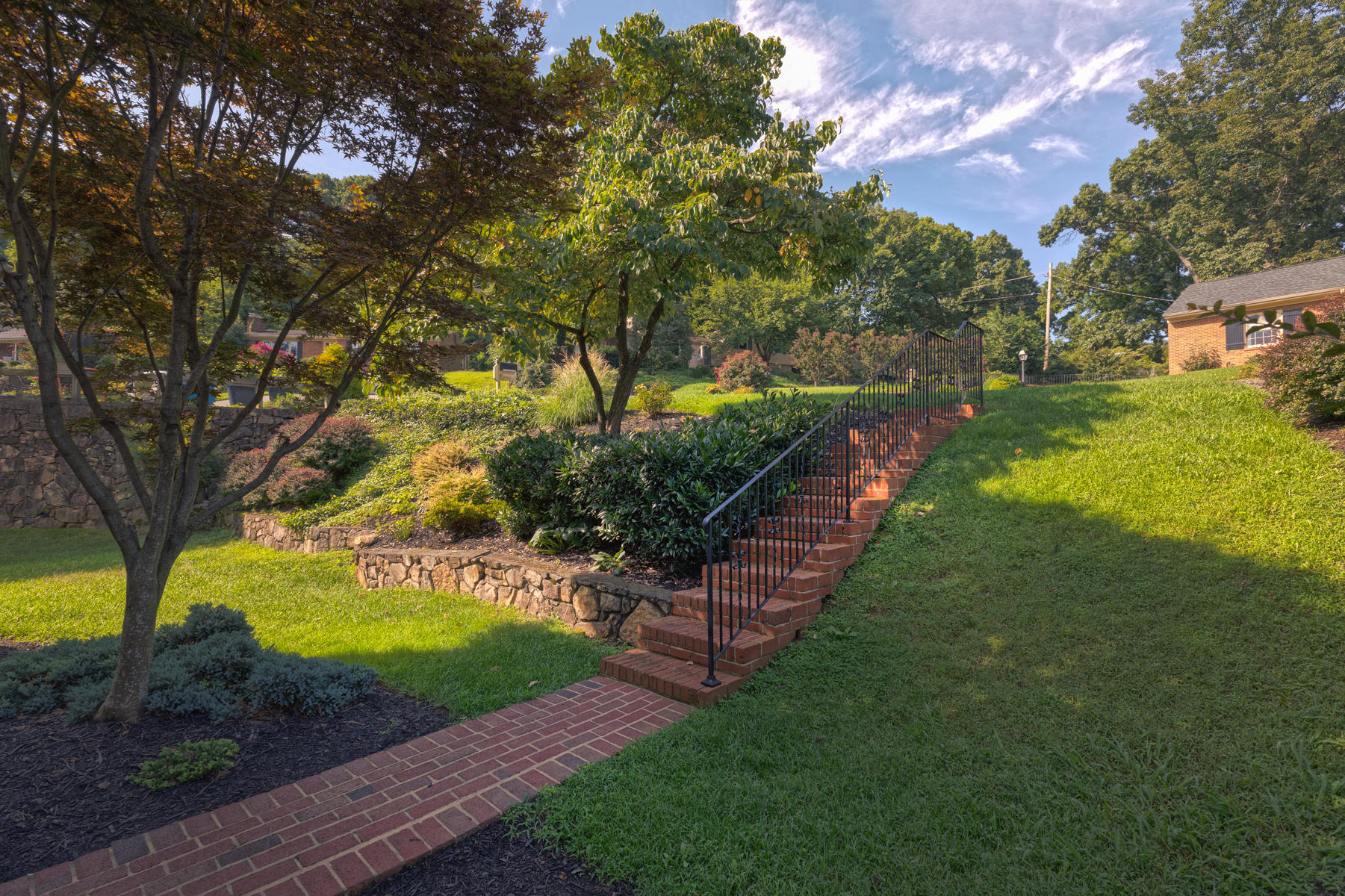 201 Parkcrest Road Southwest Roanoke, VA 24014 - Photo 31 of 39 a view of a yard with plants and a large tree