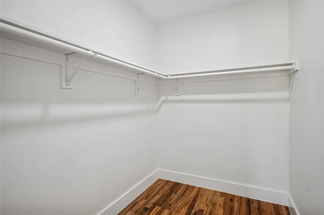 a view of a room with racks on the wall