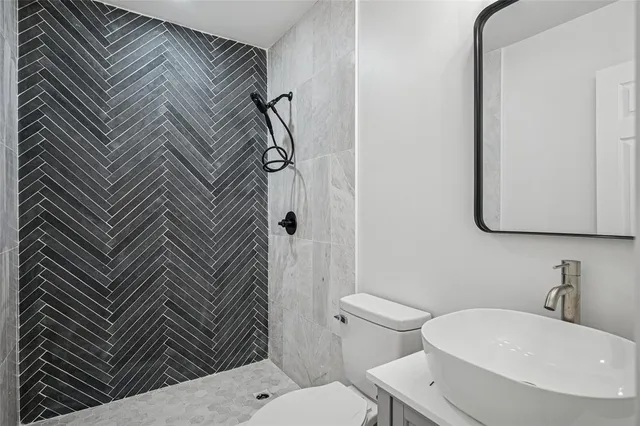 a bathroom with a sink and a toilet