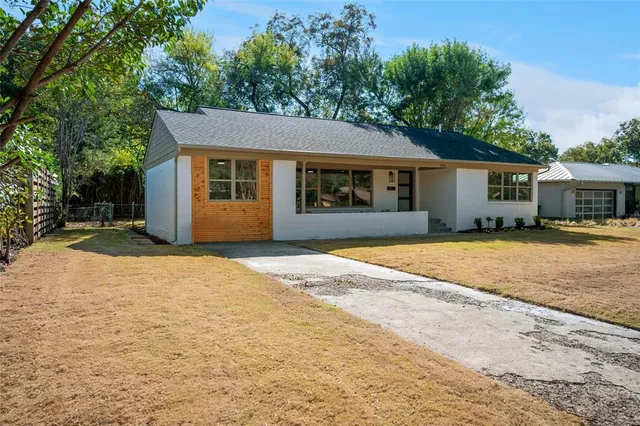front view of a house and a yard