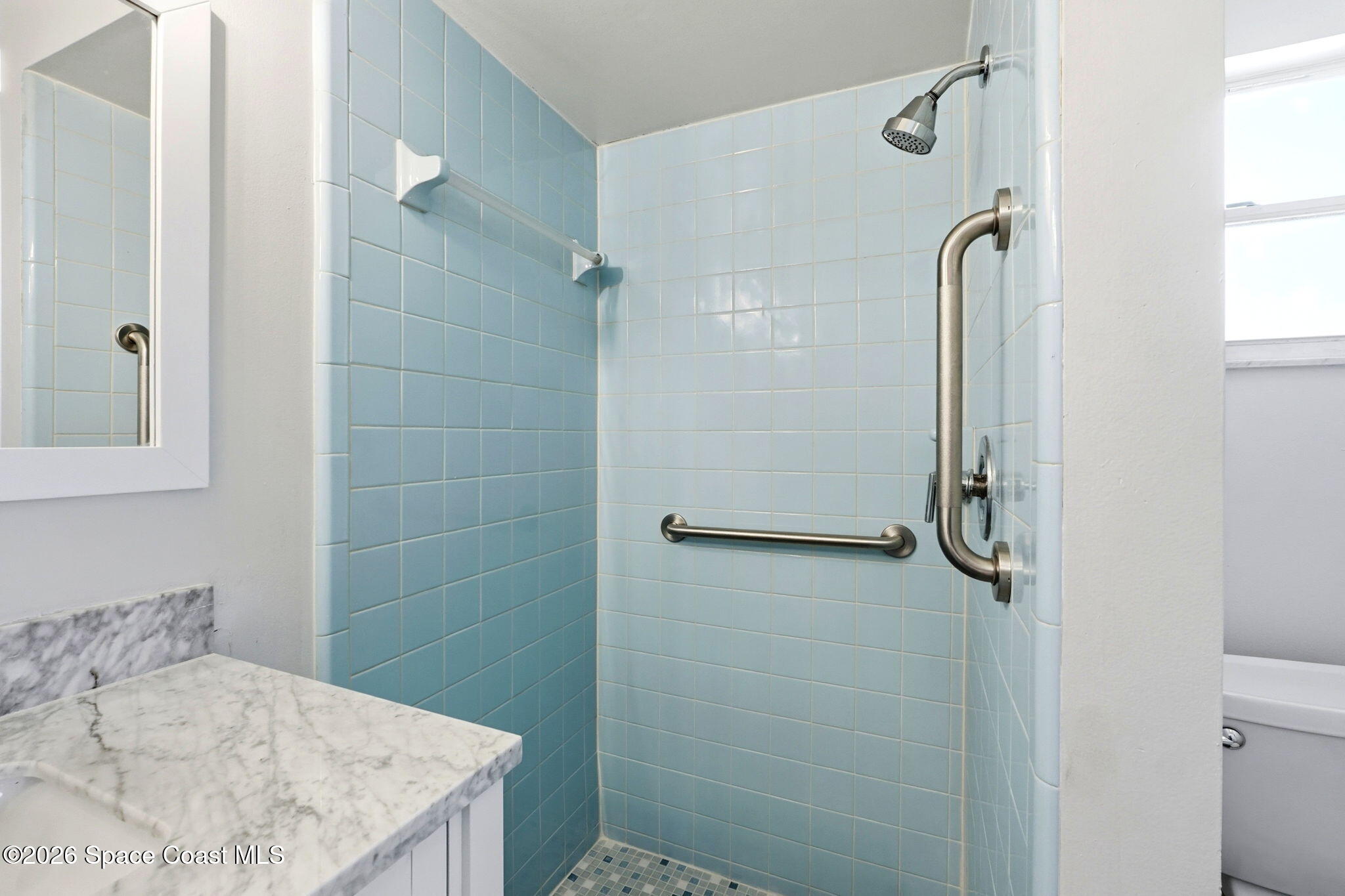2519 Mill Run Boulevard Kissimmee, FL 34744 - Photo 20 of 36 Walk-in shower with a hint of nostalgia