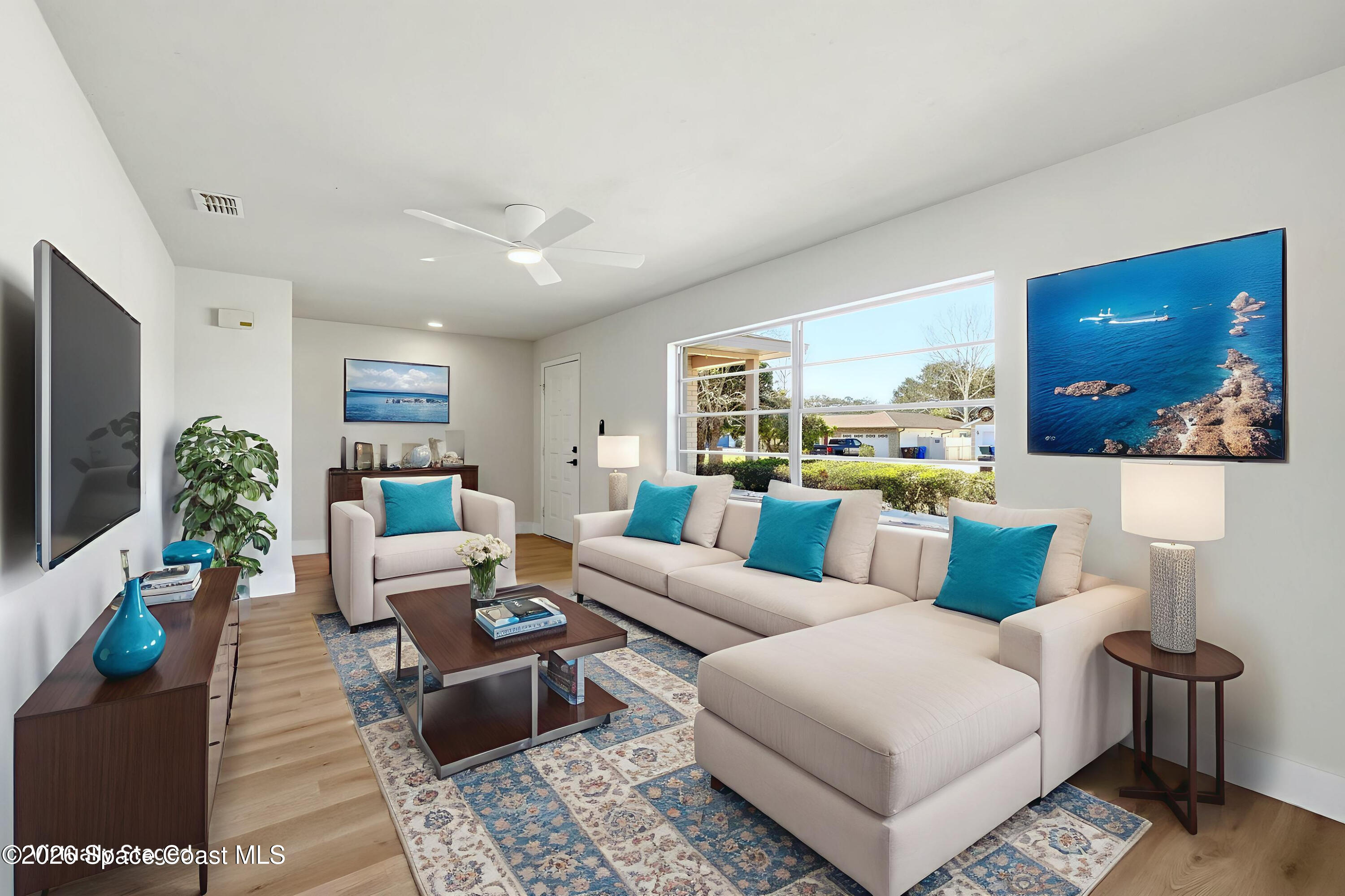 2519 Mill Run Boulevard Kissimmee, FL 34744 - Photo 6 of 36 Coastal Living Room 2519 Mill Run Staged