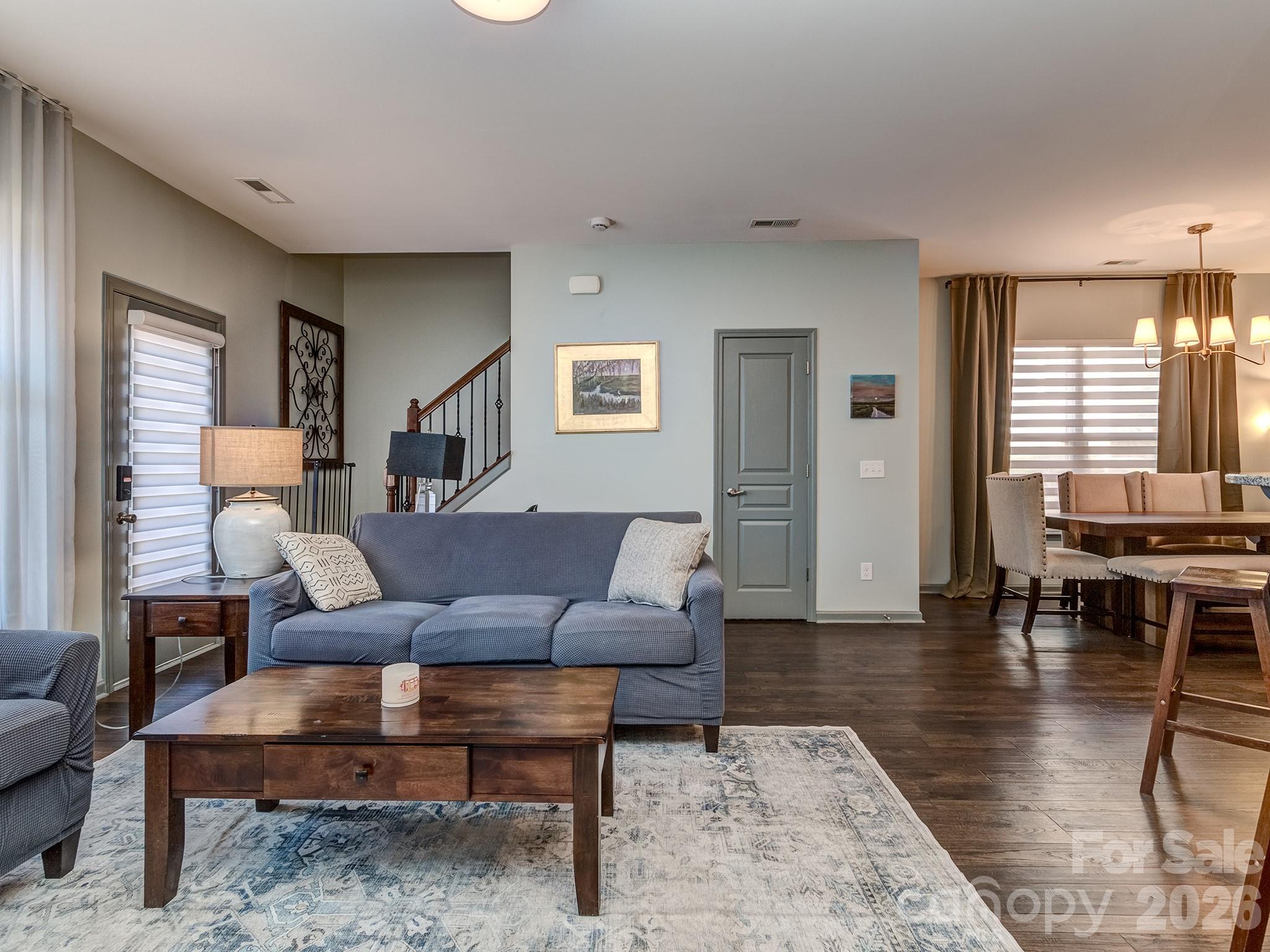 6236 Rockefeller Lane Charlotte, NC 28210 - Photo 12 of 26 a living room with furniture and wooden floor