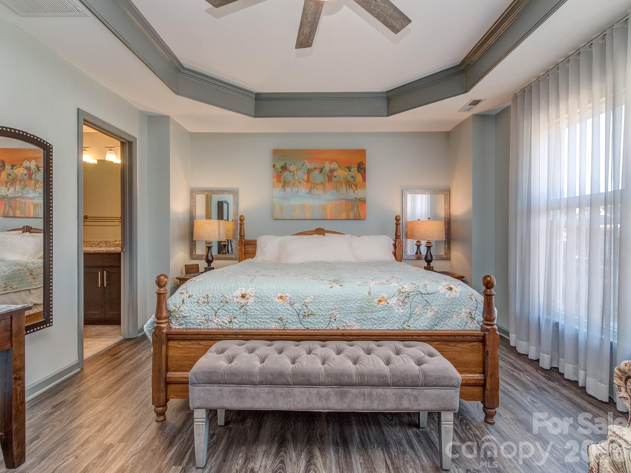 6236 Rockefeller Lane Charlotte, NC 28210 - Photo 15 of 26 a bedroom with a bed mirror and window