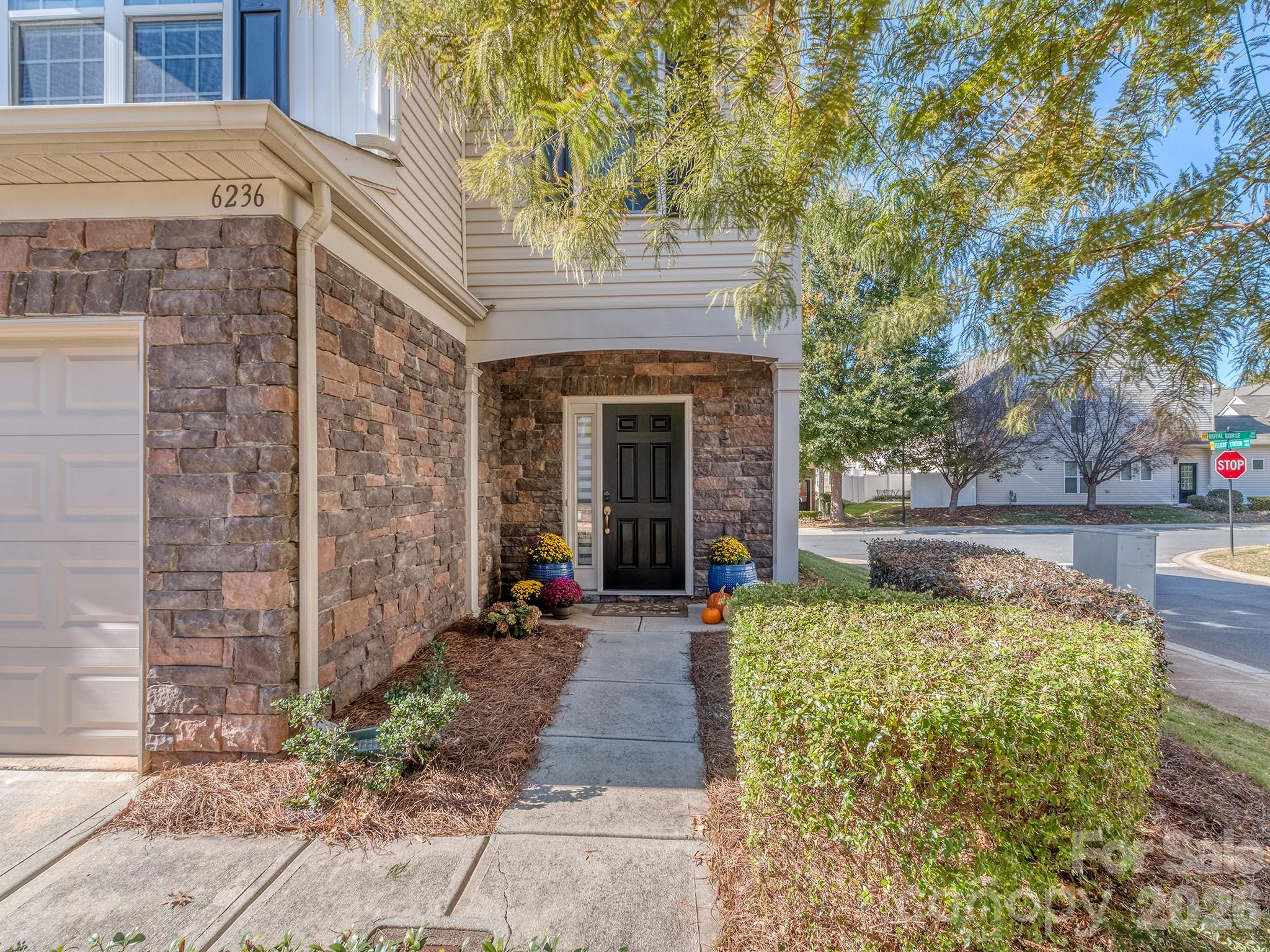 6236 Rockefeller Lane Charlotte, NC 28210 - Photo 2 of 26 a front view of a house with garden