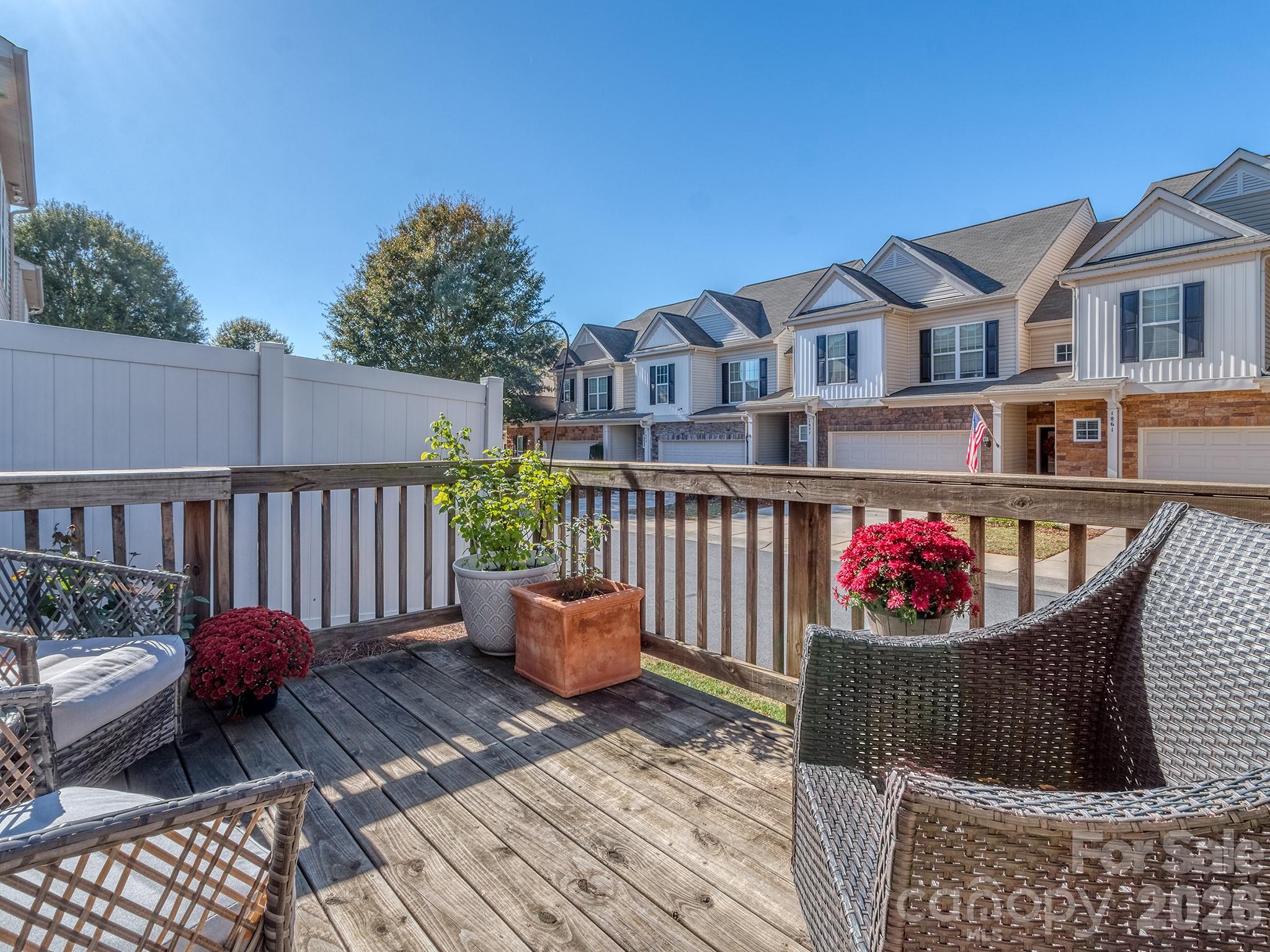 6236 Rockefeller Lane Charlotte, NC 28210 - Photo 25 of 26 a view of a roof deck with wooden floor and fence