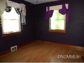 661 Thompson Cove Road Clyde, NC 28721 - Photo 6 of 7 a view of an empty room with a window