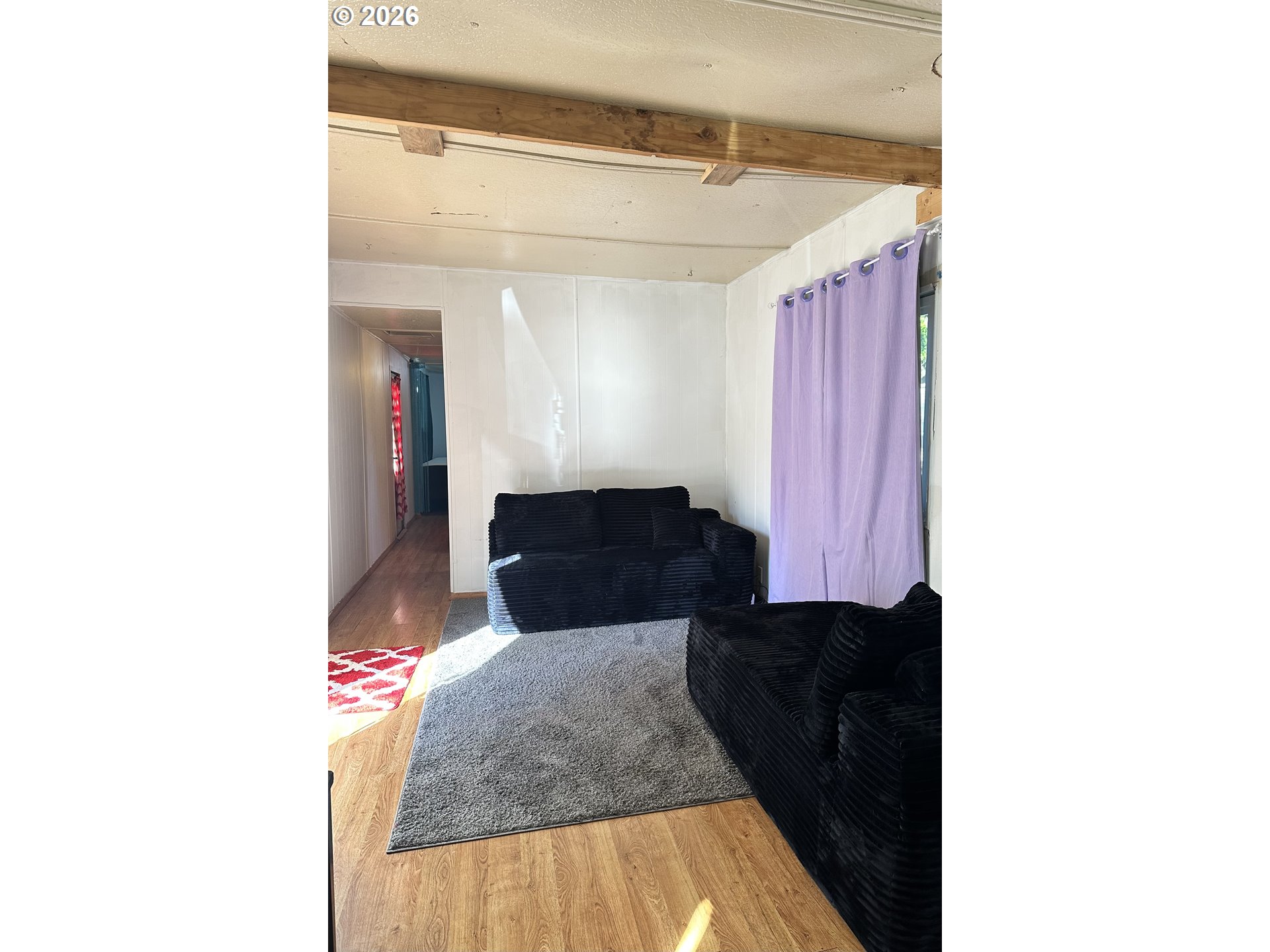 37635 Row River Road, Unit 7 Dorena, OR 97434 - Photo 13 of 27 a living room with a couch and a coffee table