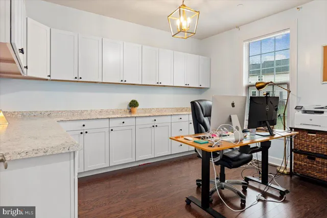 a workspace with cabinets