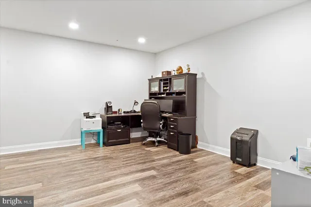 a view of a workspace with furniture