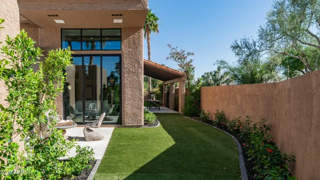 a picture of flowers with wooden fence