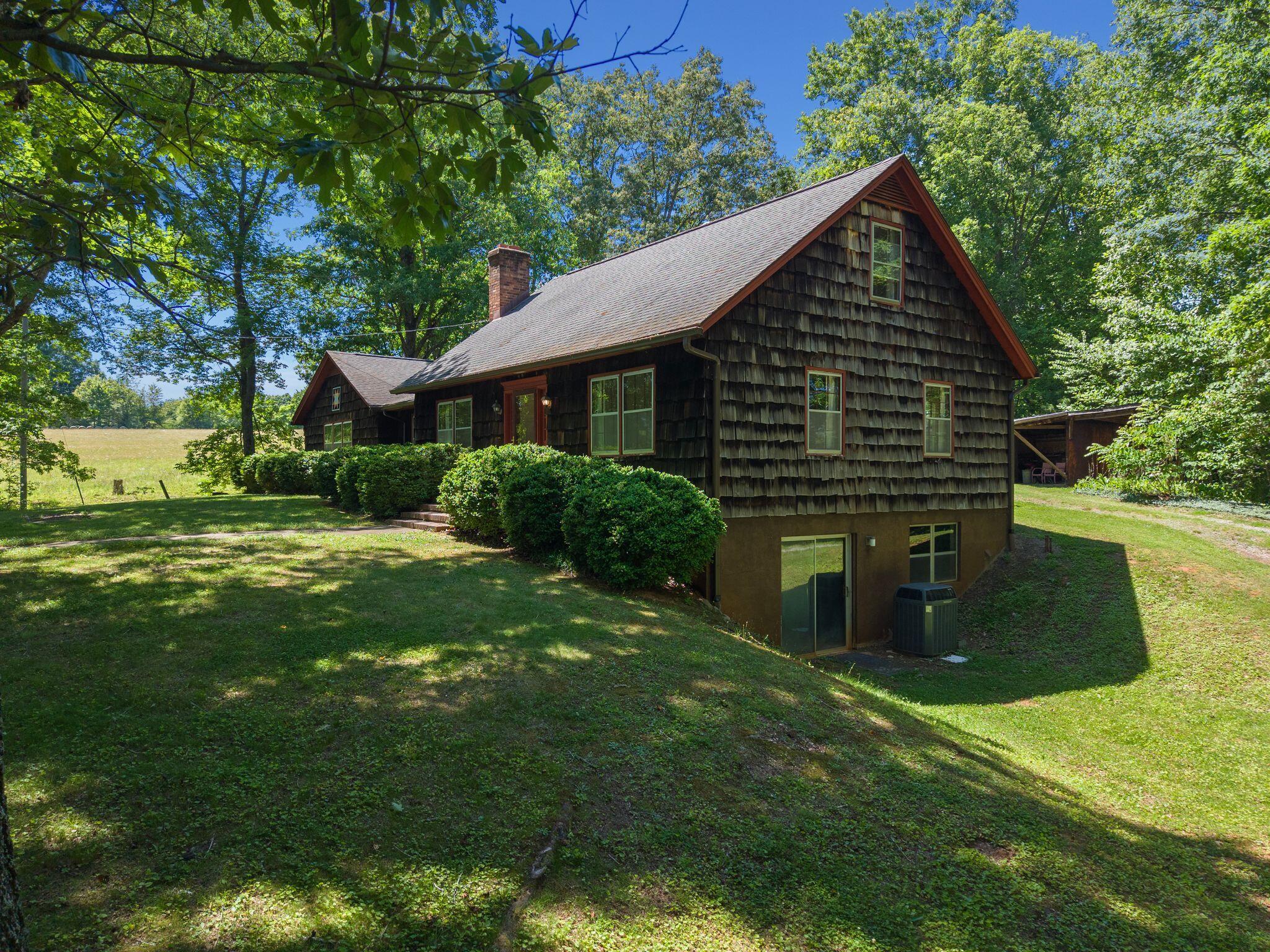 1115 Robin Ridge Road Henry, VA 24102 - Photo 32 of 54 a view of a house with a yard