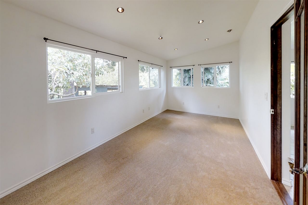 911 Kauhikoa Road Haiku, HI 96708 - Photo 12 of 30 a view of an empty room with a window