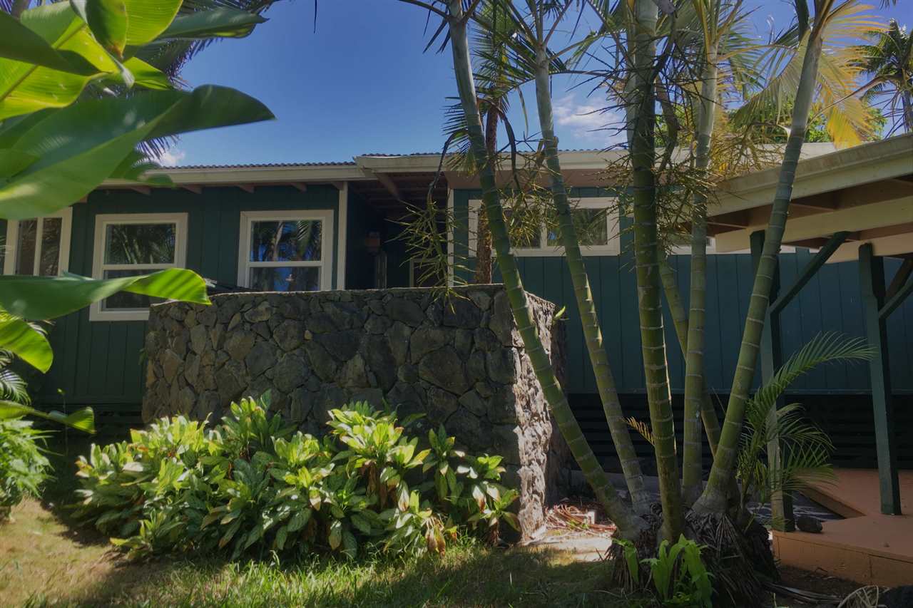 911 Kauhikoa Road Haiku, HI 96708 - Photo 29 of 30 a view of a house with a garden