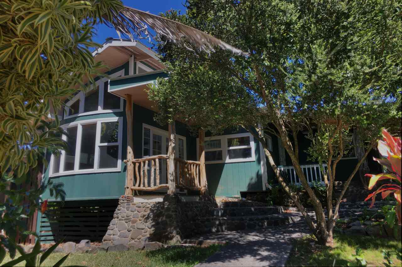 911 Kauhikoa Road Haiku, HI 96708 - Photo 3 of 30 a front view of a house with garden