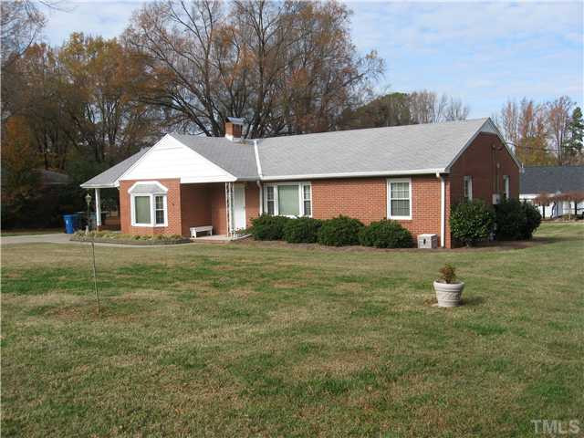 1016 Horton Road Durham, NC 27704 - Photo 3 of 6 a front view of a house with a yard