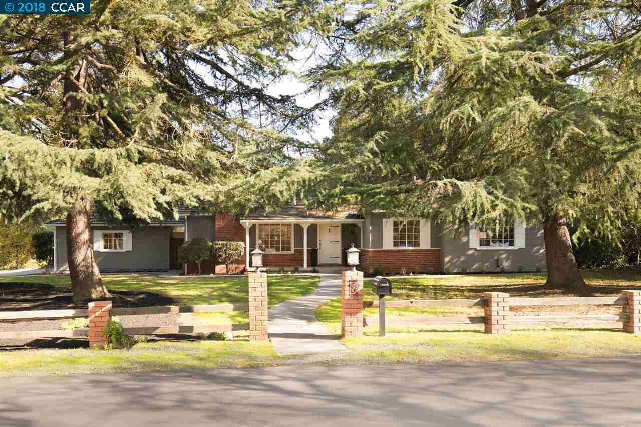 3514 Freeman Road Walnut Creek, CA 94595 - Photo 1 of 1 a view of a swimming pool with couches chairs and a small yard
