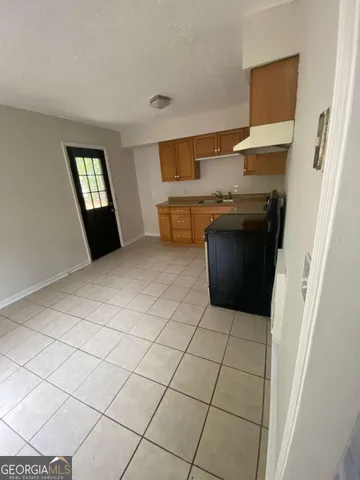 a kitchen with a cabinets