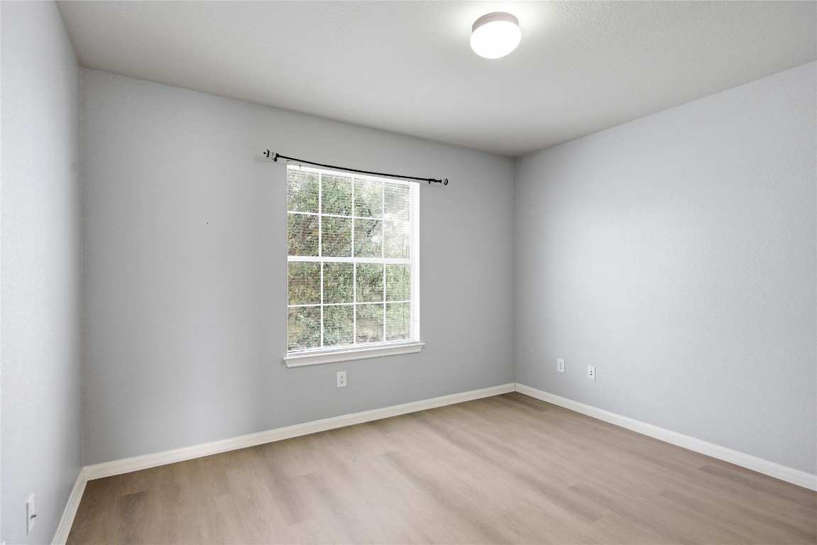 4410 Meadowside Lane Round Rock, TX 78665 - Photo 15 of 22 an empty room with a window