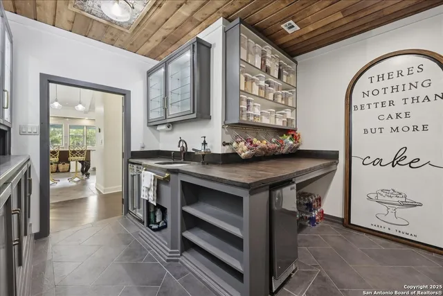 a view of hall way with furniture