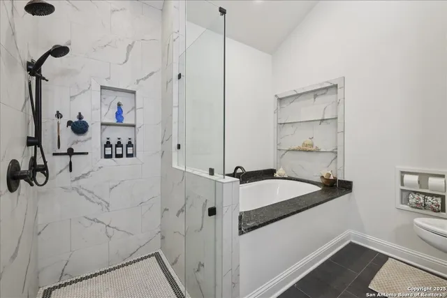 a bathroom with a sink and a shower