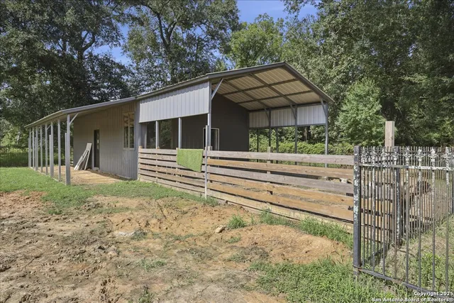 a house with trees in front of it