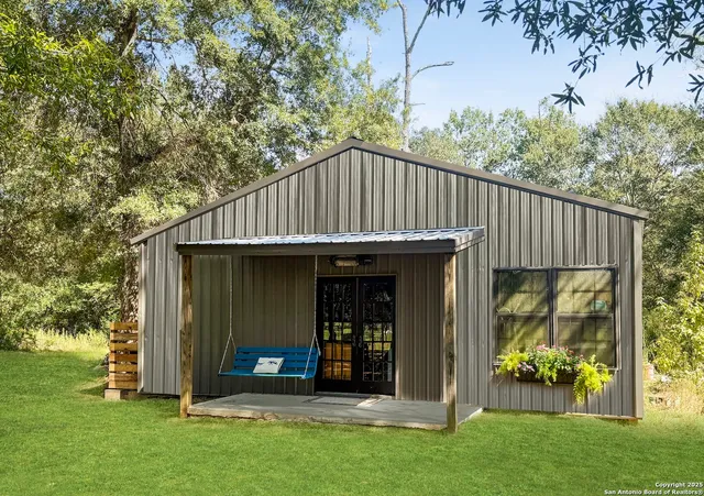 a view of a house with garden