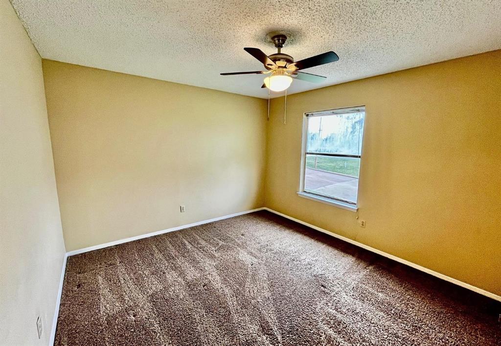 400 Amber Lane, Unit 3 Crowley, TX 76036 - Photo 13 of 16 a view of empty room with window