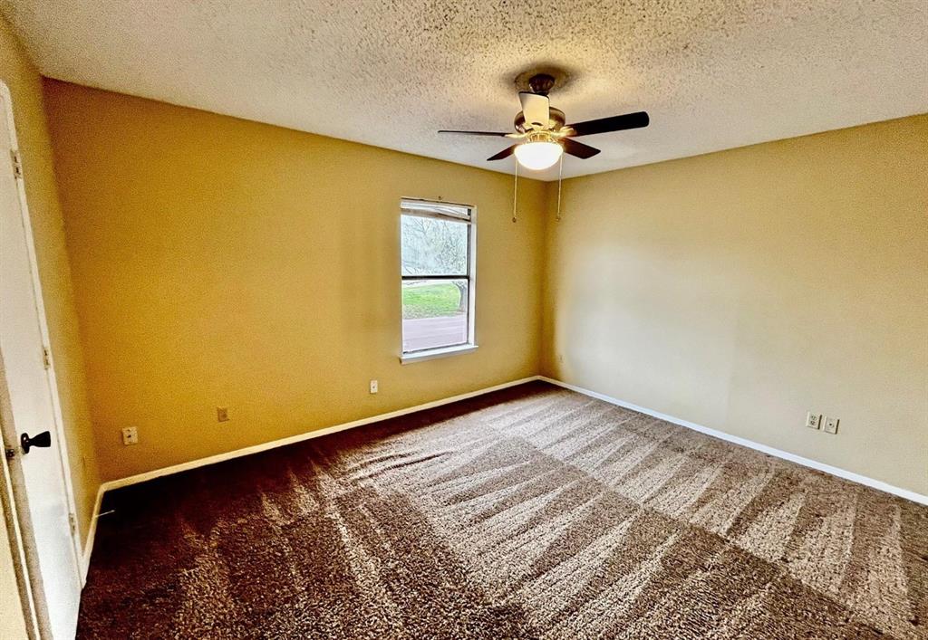 400 Amber Lane, Unit 3 Crowley, TX 76036 - Photo 16 of 16 a view of a room with a large window