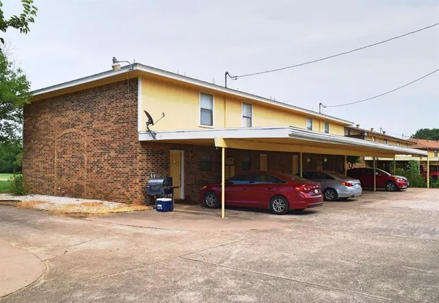 a car parked in front of garage
