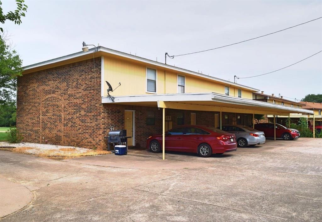 400 Amber Lane, Unit 3 Crowley, TX 76036 - Photo 4 of 16 a car parked in front of garage