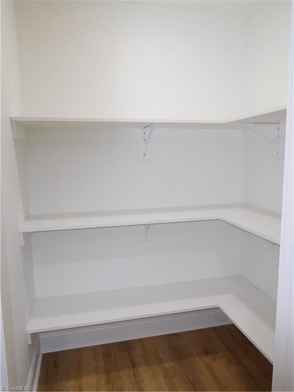 4210 Country Club Road Winston-Salem, NC 27104 - Photo 12 of 41 LARGE WALK-IN PANTRY OFF KITCHEN. THERE IS A 2ND WALK-IN CLOSET & HALF BATH AROUND THE CORNER FROM KITCHEN.