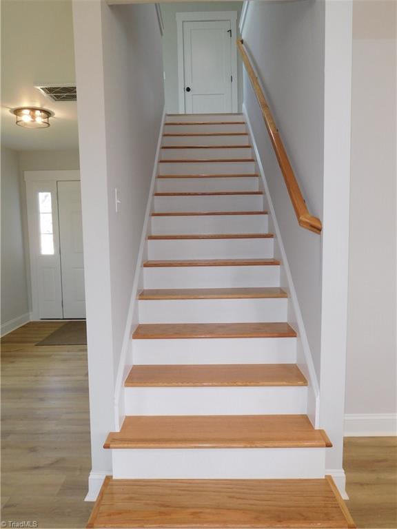 4210 Country Club Road Winston-Salem, NC 27104 - Photo 13 of 41 BEAUTIFUL STAIRCASE.