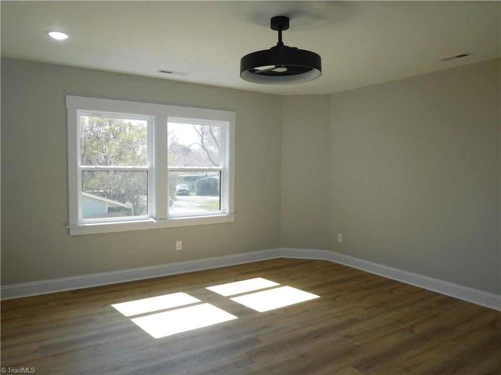 4210 Country Club Road Winston-Salem, NC 27104 - Photo 14 of 41 PRIMARY BEDROOM ON 2ND FLOOR. FLOORING CONTINUES.
