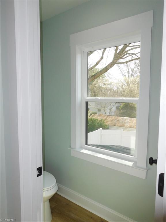 4210 Country Club Road Winston-Salem, NC 27104 - Photo 18 of 41 HIDDEN TOILET FOR MORE PRIVACY.