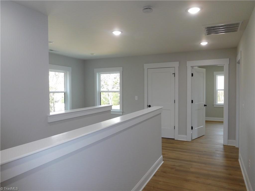 4210 Country Club Road Winston-Salem, NC 27104 - Photo 20 of 41 LOOKING DOWN THE HALL ON 2ND FLOOR.