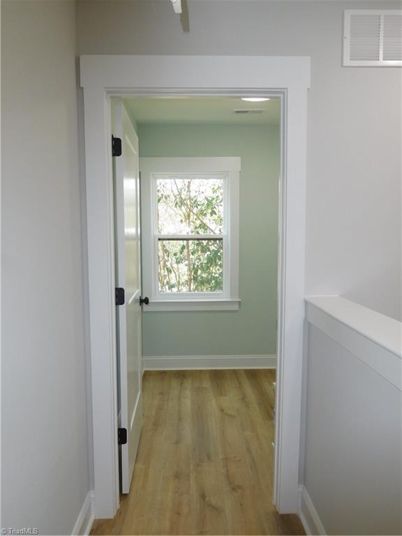 4210 Country Club Road Winston-Salem, NC 27104 - Photo 21 of 41 HALL LEADING TO WALK-IN LAUNDRY ROOM.