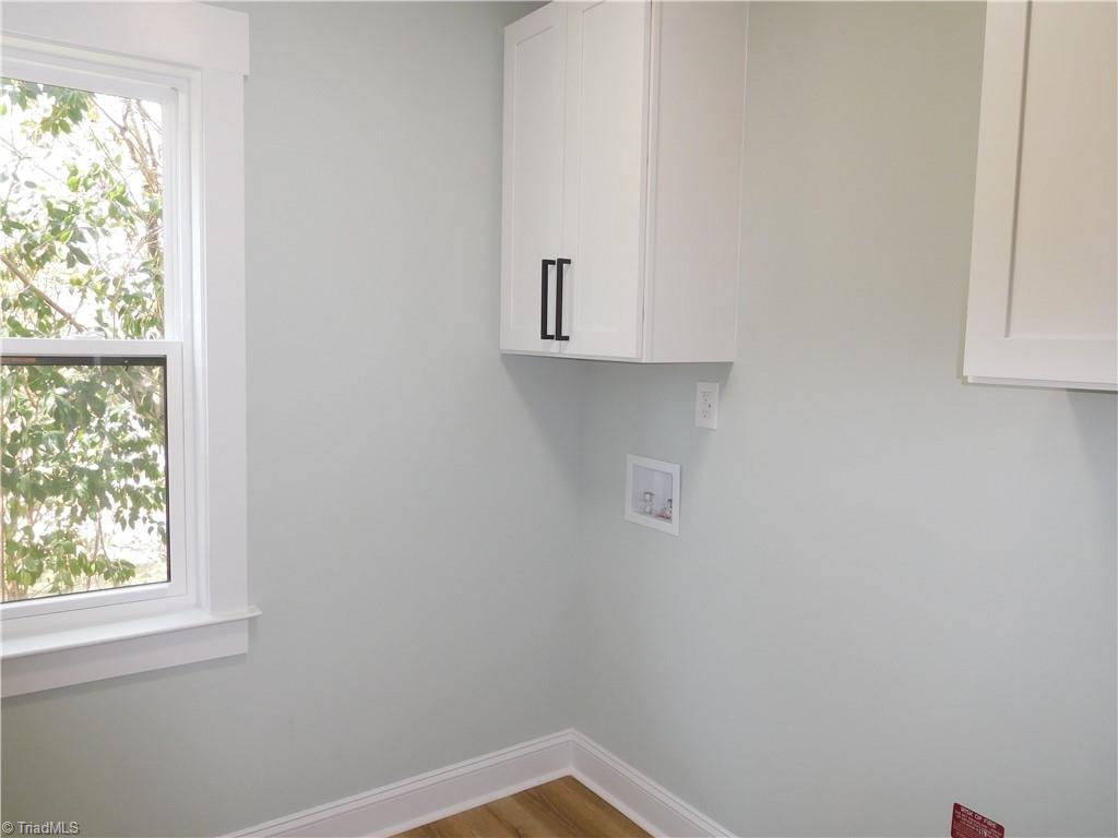4210 Country Club Road Winston-Salem, NC 27104 - Photo 22 of 41 LAUNDRY ROOM W/STORAGE SPACE.
