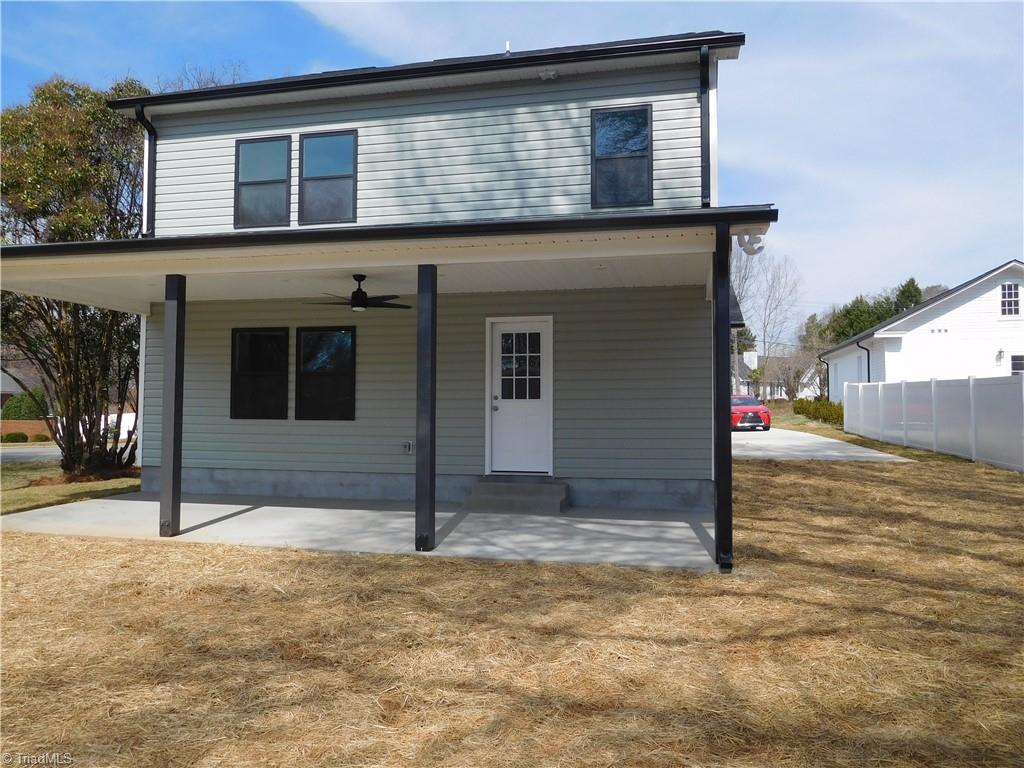 4210 Country Club Road Winston-Salem, NC 27104 - Photo 37 of 41 AMPLE PARKING WITH DOUBLE CAR GARAGE, OVERSIZED DRIVEWAY AND PARKING PAD ON SIDE OF HOME.