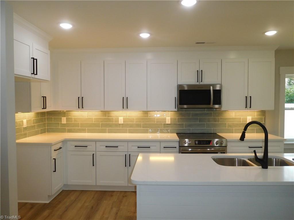 4210 Country Club Road Winston-Salem, NC 27104 - Photo 7 of 41 PLENTY OF WORKSPACE & STORAGE.