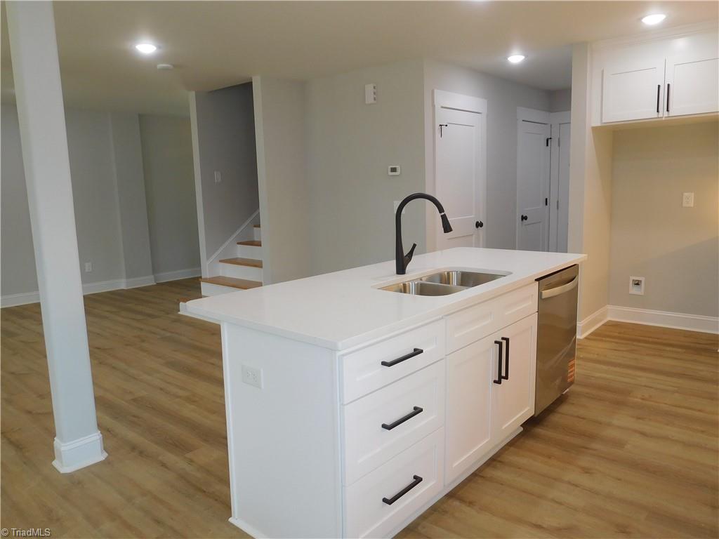 4210 Country Club Road Winston-Salem, NC 27104 - Photo 8 of 41 ISLAND WITH SINK AND SPACE FOR SEATING.