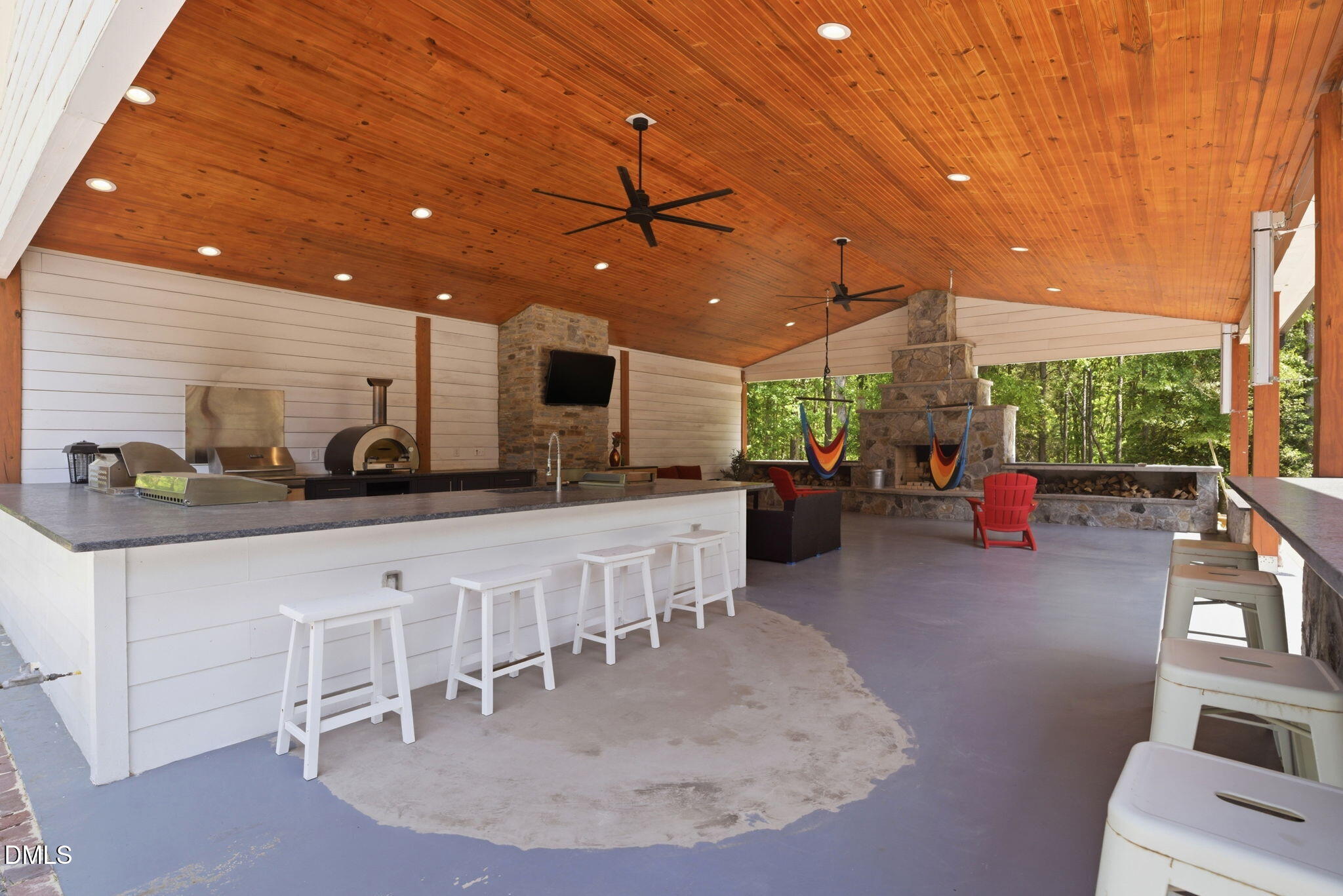 5416 Pulley Town Road Zebulon, NC 27597 - Photo 7 of 74 an open kitchen with a table and chairs in it