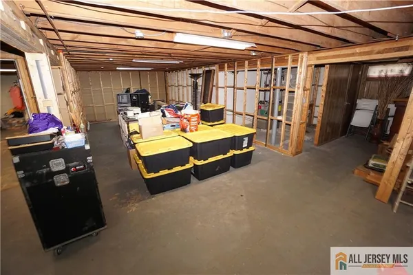 a bed room with a bed and a mirror