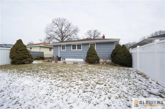 a view of a house with a window and yard