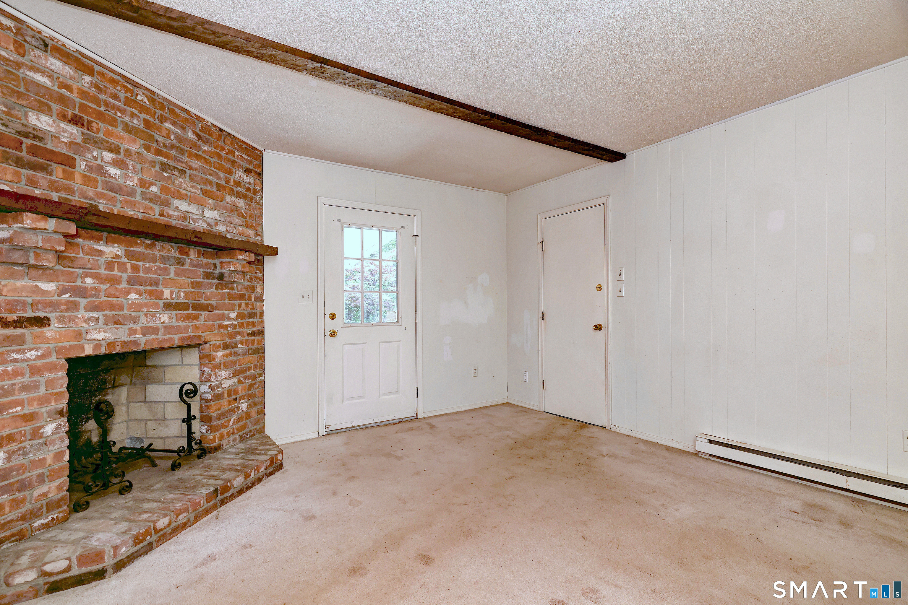 22 East Woods Road Roxbury, CT 06783 - Photo 17 of 37 a view of a fireplace in an empty room