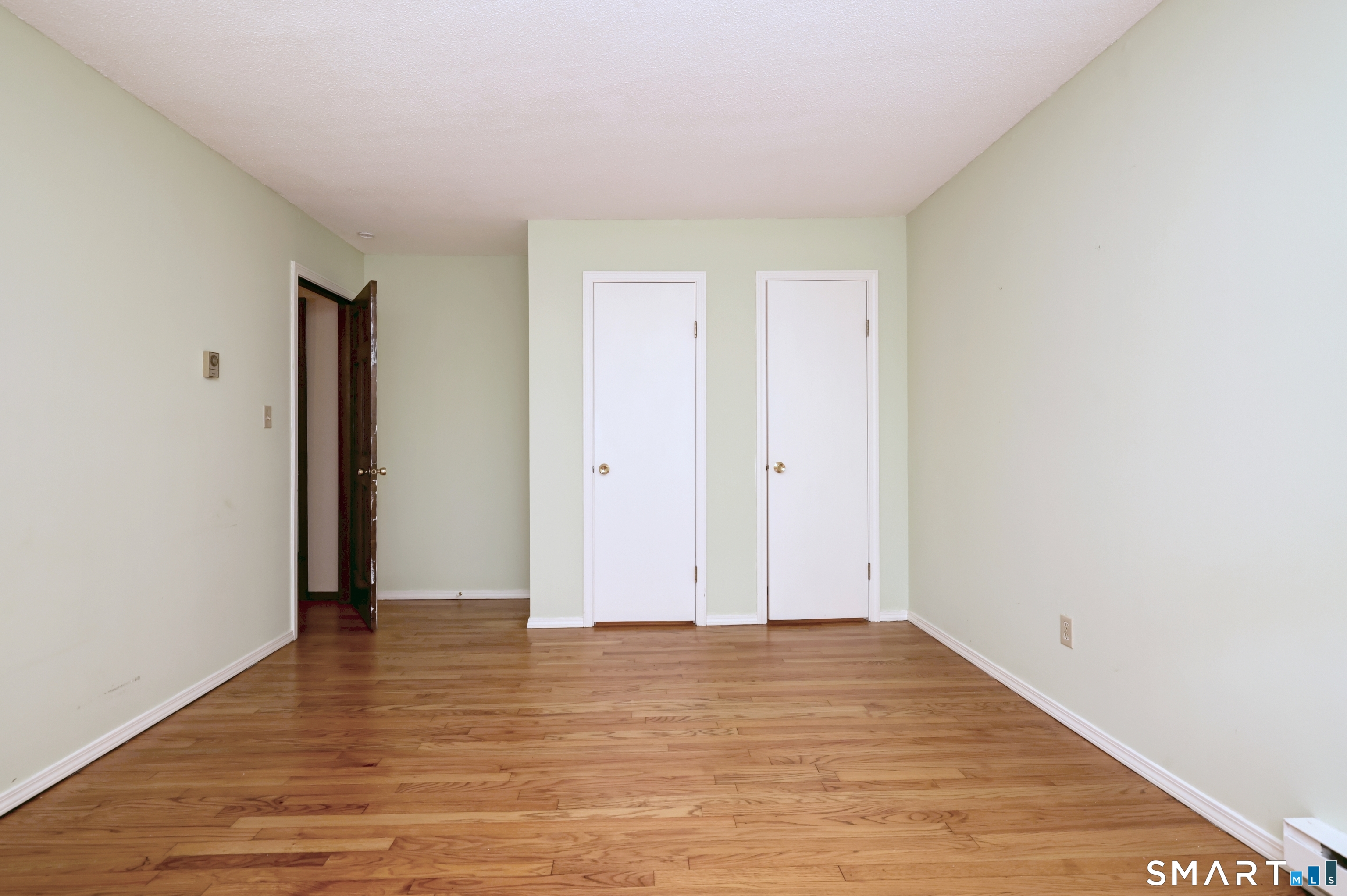 22 East Woods Road Roxbury, CT 06783 - Photo 31 of 37 a view of room with wooden floor