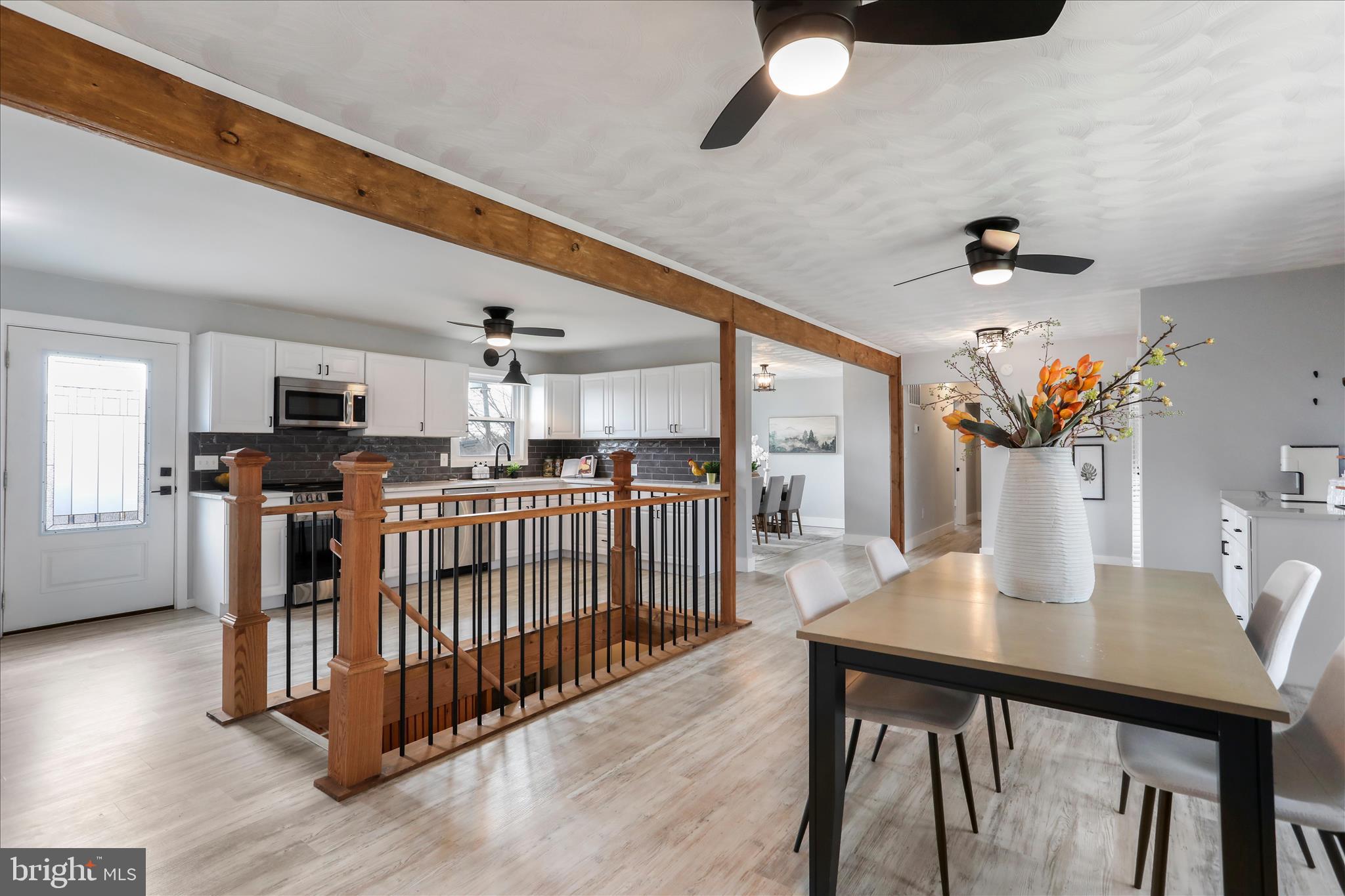 83 Dove Hill Drive Ranson, WV 25438 - Photo 13 of 71 a view of a dining room with furniture and wooden floor
