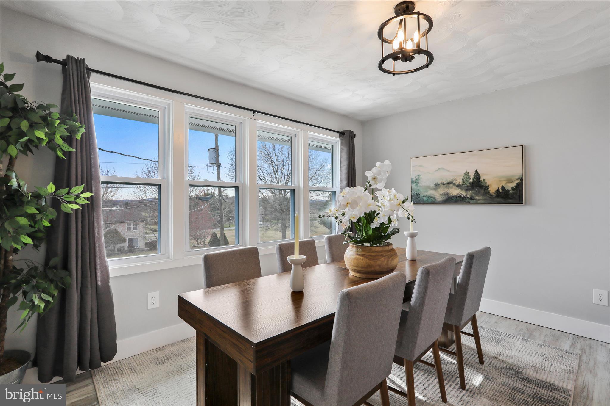 83 Dove Hill Drive Ranson, WV 25438 - Photo 19 of 71 a view of a dining room with furniture window and outside view