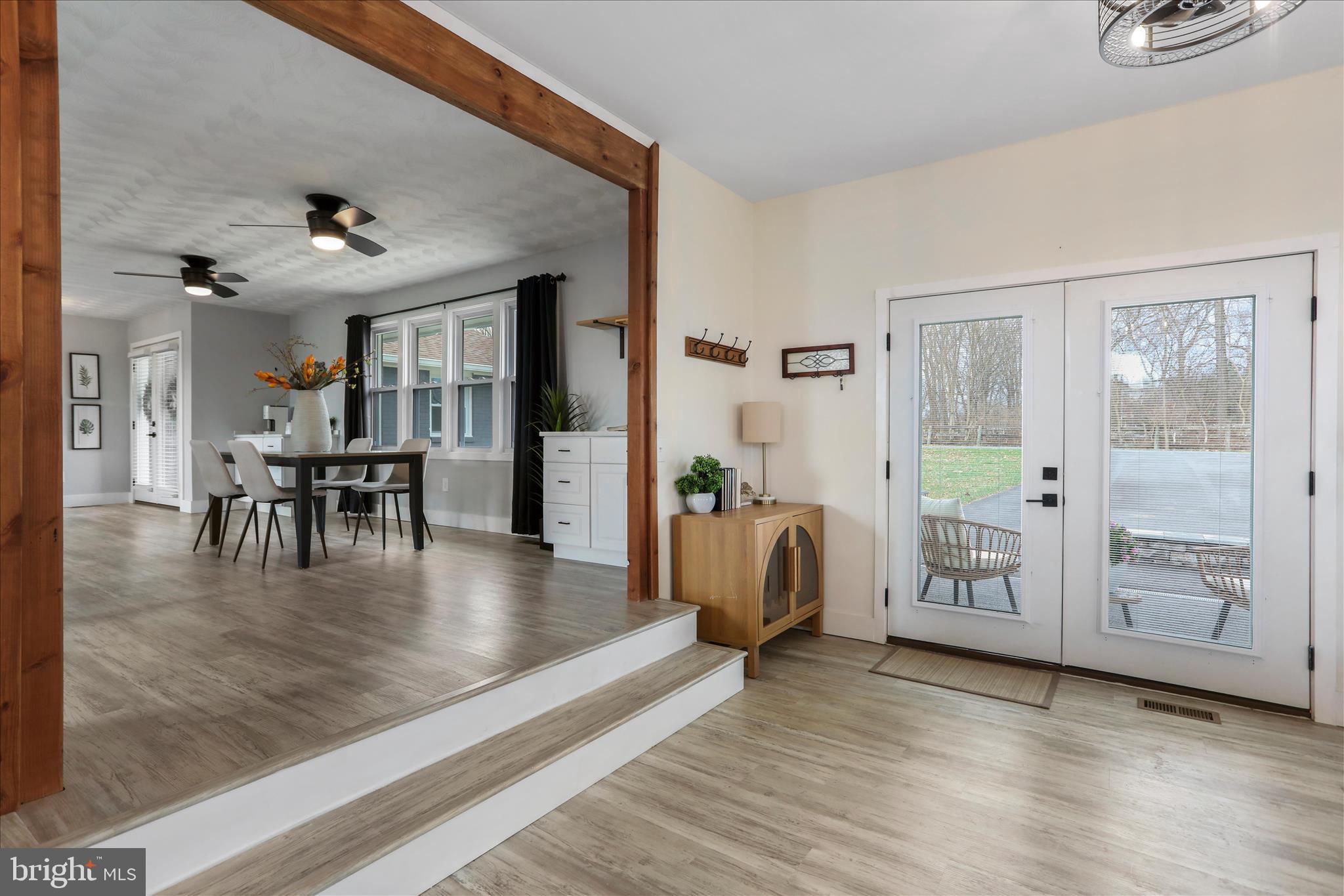 83 Dove Hill Drive Ranson, WV 25438 - Photo 20 of 71 a view of a livingroom with furniture hardwood floor and a large window